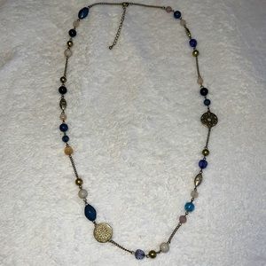 15” gold necklace with blue/white stones